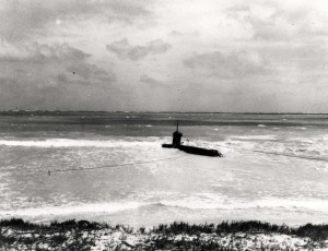 Japanese 2-man midget submarine grounded on the coral reef off Bellows Field, was commanded by Ens. Kazuo Sakamaki who swam ashore on December 8, 1941 and was captured.        