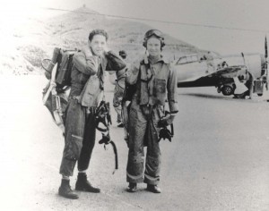 Pilots of 333rd Fighter Squadron, Bellows Field, in early 1944. Lts. Mormon and Bower prepare for familiarization flight in newly arrived P-47s.
