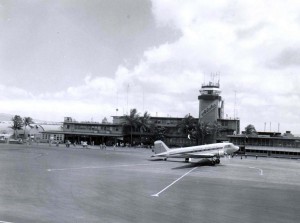 Aloha Airlines plane at Honolulu Airport, 1950s.