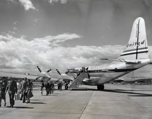 United Airlines Mainliner Stratocruiser at Honolulu International Airport. Wing span is 141 feet, length 110 feet and tail is 38 feet above the ground. 1950s. 