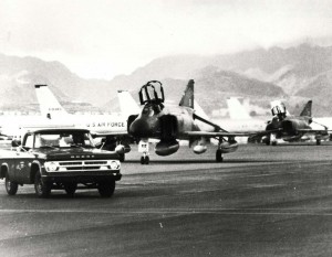 AS the fighting in Southeast Asia ceased, many of the aircraft used there stopped at Hickam Air Force Base en route back to the U.S. Mainland. In this photo are some of the 20 F-4 Phantoms parked in front of 15 KC-135 Stratotankers that transited Hickam in August 1974.