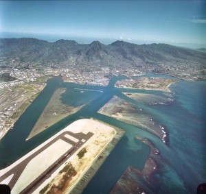 Reef Runway in foreground, with Keehi Lagoon and Honolulu in background, Honolulu International Airport, January 1, 1982.  