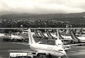 Interisland ramp area, Honolulu International Airport, with Aloha and Hawaiian planes, 1980s. 