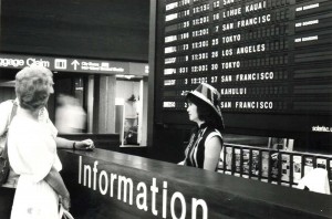 Visitor Information Program desk, Honolulu International Airport, 1980s. 