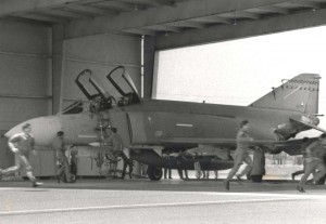 Hawaii Air National Guard alert crews dash to their F-4 aircraft at Hickam Air Force Base, Hawaii, for one last practice scramble before being relieved of the responsibility for defending Hawaii's airspace to the new F-15 Eagles, September 1, 1987.  