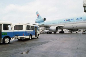 Wiki Wiki Bus on ramp at Honolulu International Airport, 1990s.