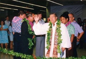 The Rev. William Kaina blesses the new baggage claim facilities at Honolulu International Airport, 1994.