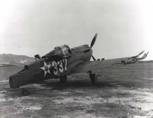 Three P-40s that attempted to take off from Bellows Field on December 7, 1941 were shot down immediately. Most of the 12 P-40s there, like this one, lined up in neat rows, were riddled by Japanese machine gun fire. 